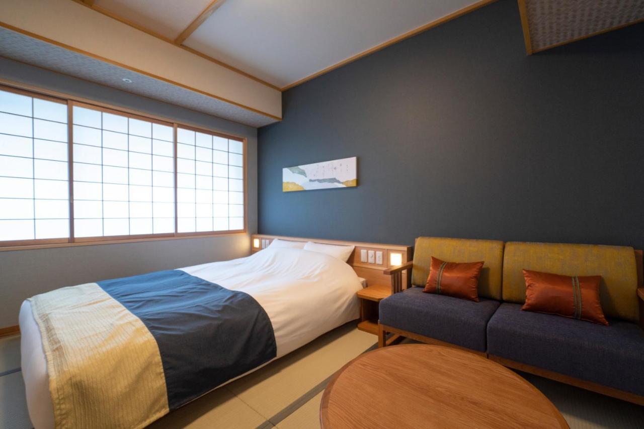 Hotel Kyoto Umekoji Kadensho Esterno foto A room at the hotel