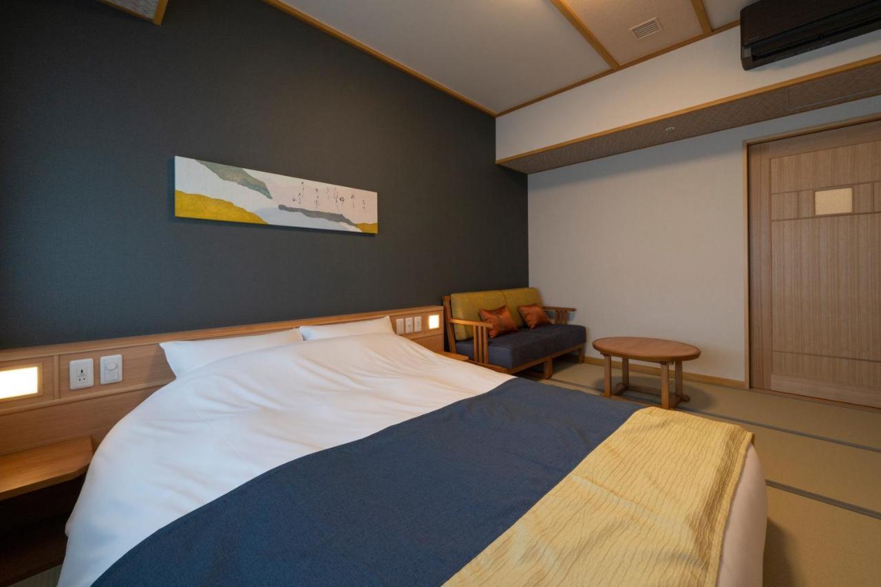 Hotel Kyoto Umekoji Kadensho Esterno foto A room at the hotel