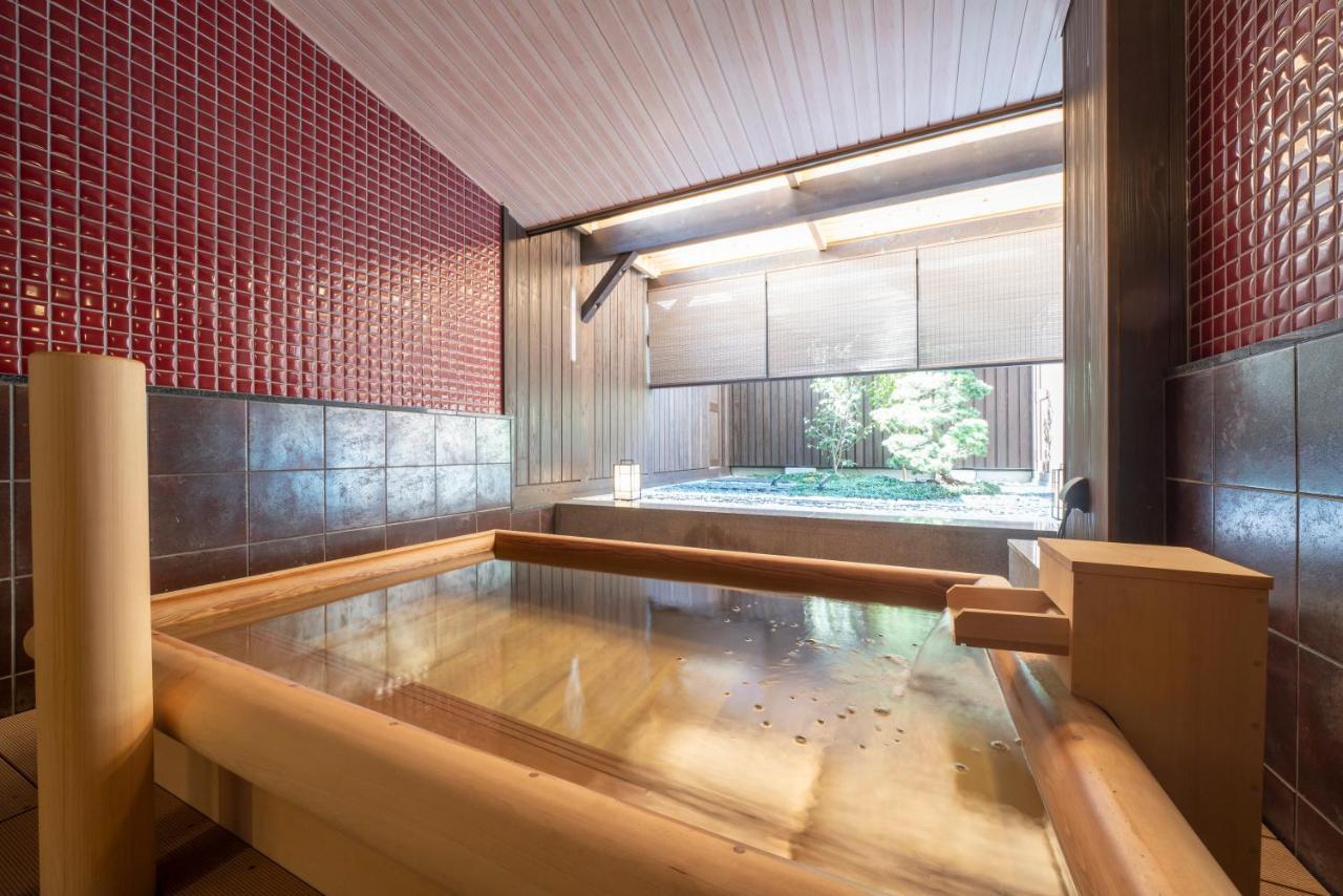 Hotel Kyoto Umekoji Kadensho Esterno foto A modern onsen