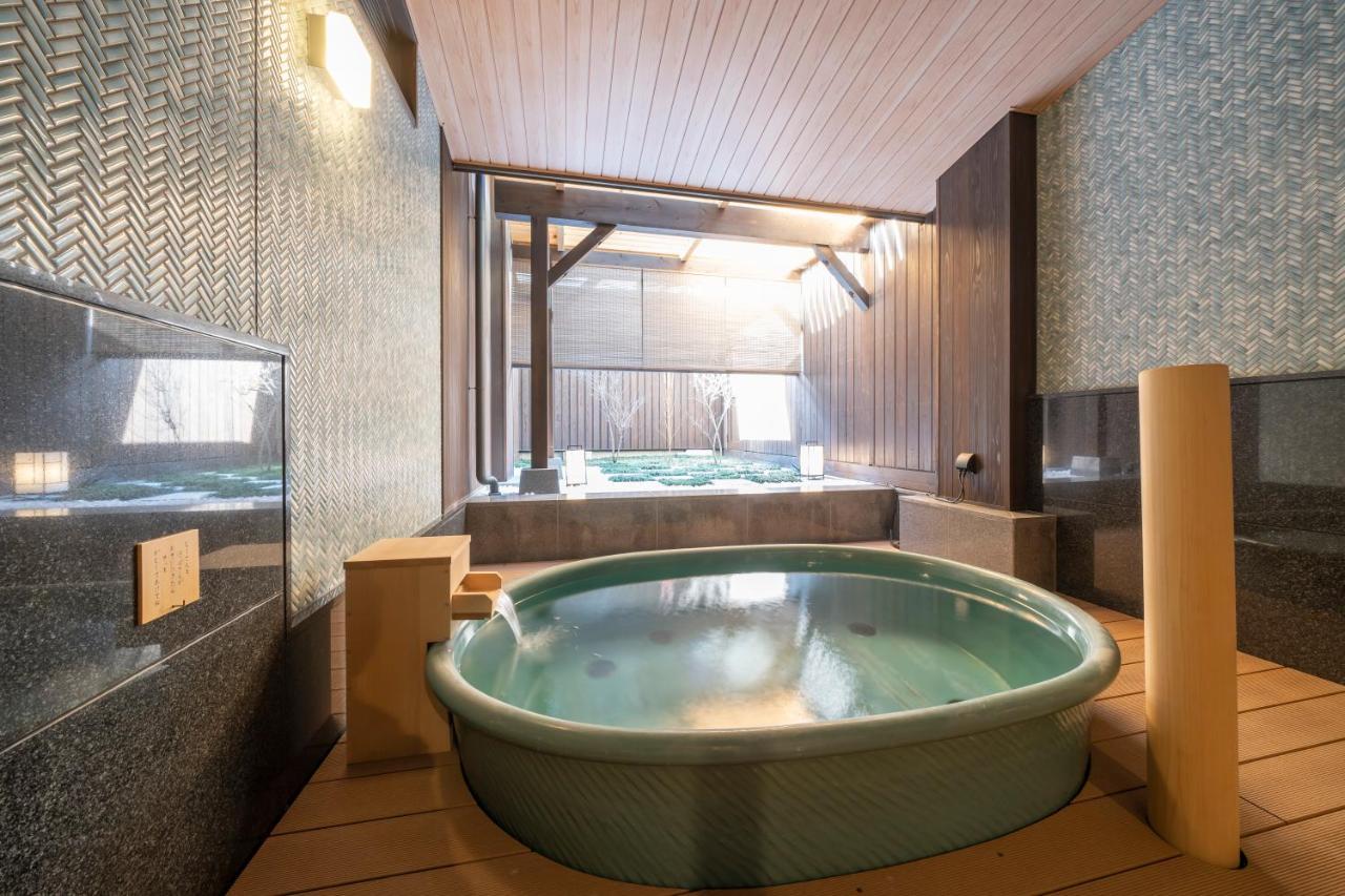 Hotel Kyoto Umekoji Kadensho Esterno foto A modern onsen