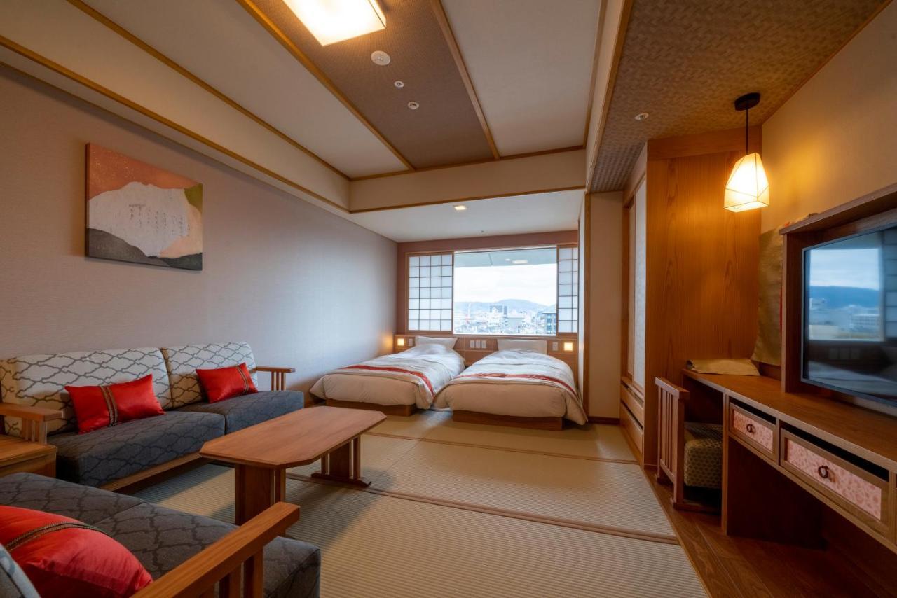 Hotel Kyoto Umekoji Kadensho Esterno foto A room at the hotel