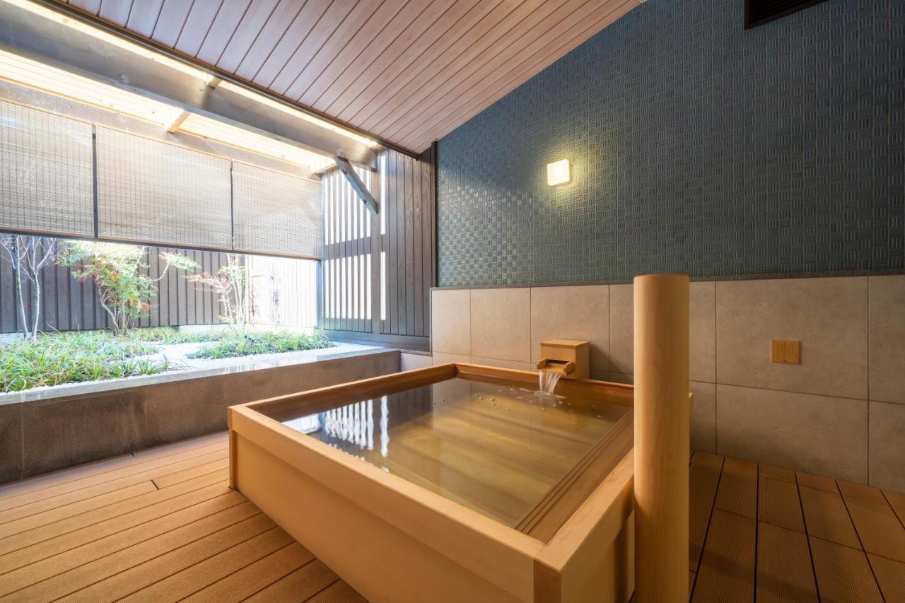 Hotel Kyoto Umekoji Kadensho Esterno foto A modern onsen bath