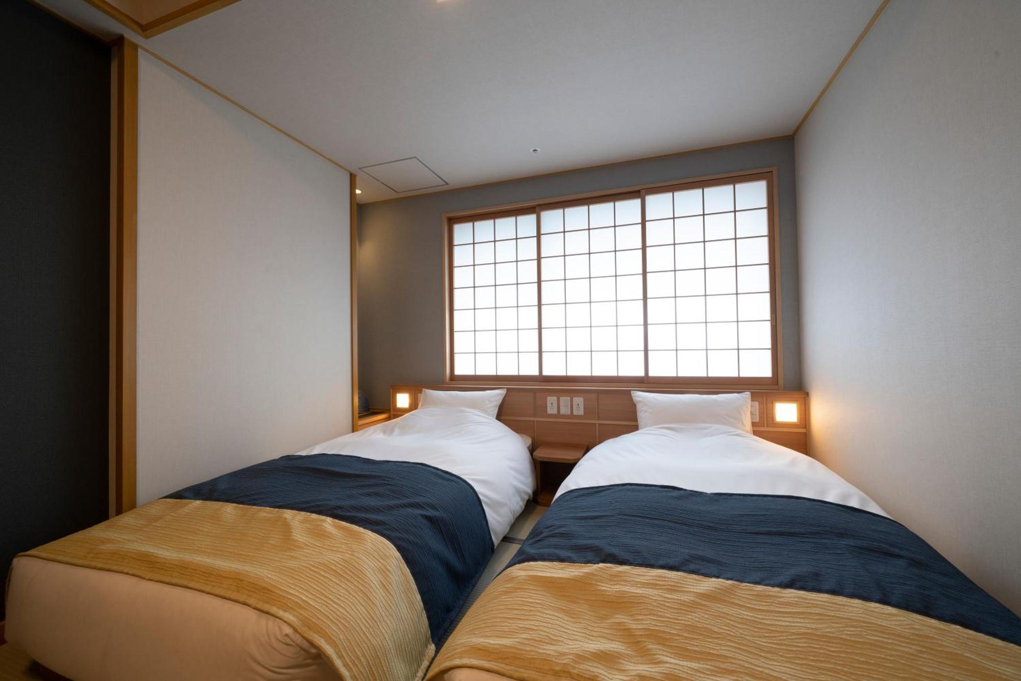 Hotel Kyoto Umekoji Kadensho Esterno foto A room at the hotel